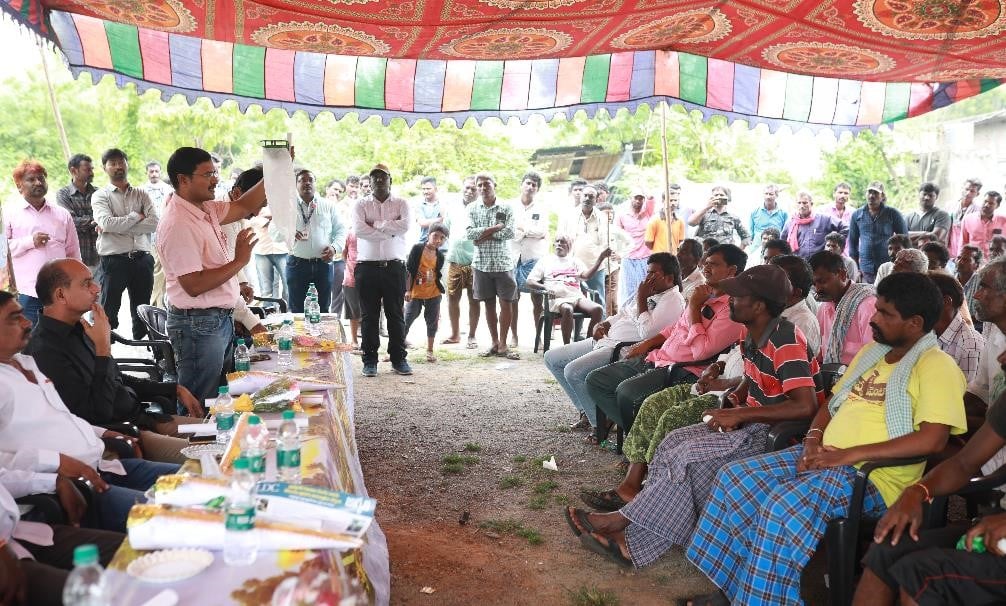 LDC team demonstrating the use of pheromone traps during the workshop at Damera Village.